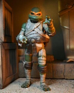 NECA *PRE-ORDER Universal Monsters X Teenage Mutant Ninja Turtles - Michelangelo (The Mummy) 11 NECA *PRE-ORDER Universal Monsters X Teenage Mutant Ninja Turtles - Michelangelo (The Mummy) -Hasbro Store mummy5 scaled 1