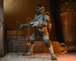 NECA *PRE-ORDER Universal Monsters X Teenage Mutant Ninja Turtles - Michelangelo (The Mummy) 12 NECA *PRE-ORDER Universal Monsters X Teenage Mutant Ninja Turtles - Michelangelo (The Mummy) -Hasbro Store mummy6 scaled 1